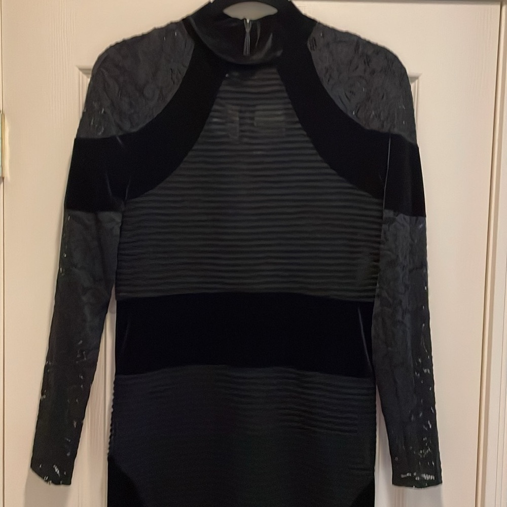 Black cocktail dress with velvet and lace detail. Size approx 8-10